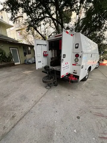 Magnet Plumbing service vehicle on-site for Water Heater Repair in Leeland